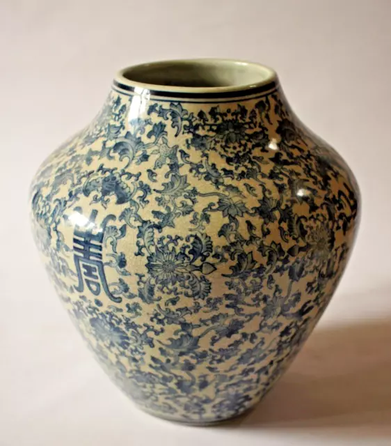 Large Chinese Vase With fine Crackle Glaze stamped to base.