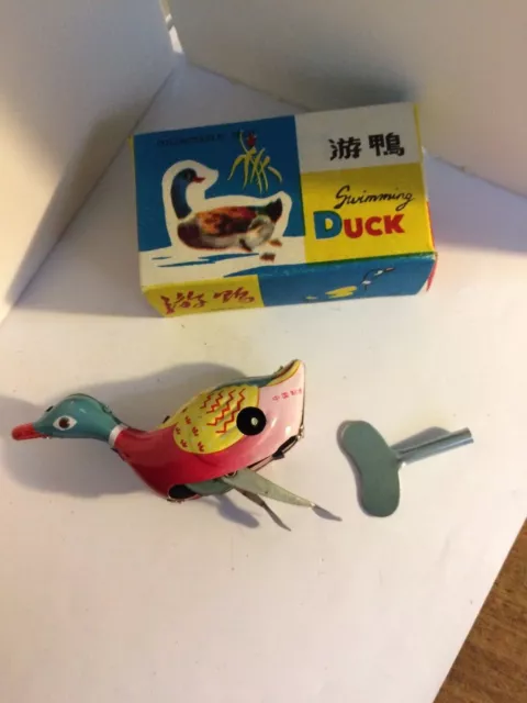 Vintage tin windup swimming duck made in China