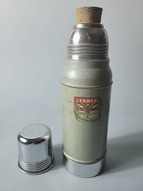 https://www.picclickimg.com/EkwAAOSw1KNlelgh/Vintage-Stanely-Super-Vac-Stainless-Steel-Thermos-With.webp
