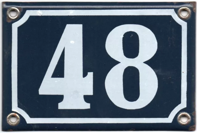 Old blue French house number 48 B door gate wall fence street sign plate plaque