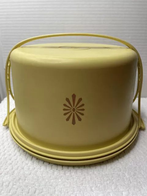 https://www.picclickimg.com/EmMAAOSwpOZlIzZv/Vintage-Tupperware-Cake-Taker-Carrier-Round-Harvest-Gold.webp