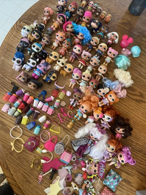 Huge Lot Of 55 LOL Surprise Dolls, Bottles, Outfits, And Accessories