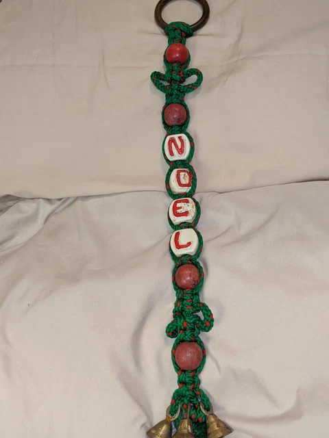 Vtg Hanging Macrame W/ Noel Ceramic Blocks, Red Beads, Bells on Bottom. 23".
