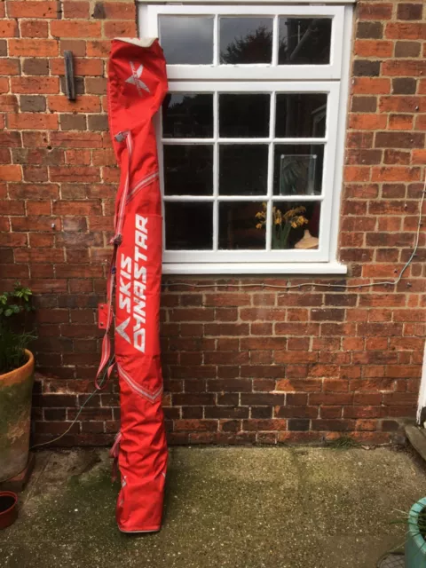 2 pairs of cross country skis, boots, poles and Dynastar bag