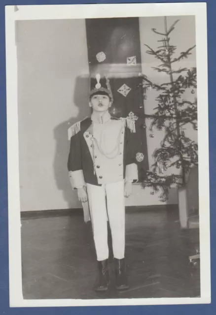 Beautiful Boy in a New Year's costume near Christmas tree. Soviet Vintage Photo