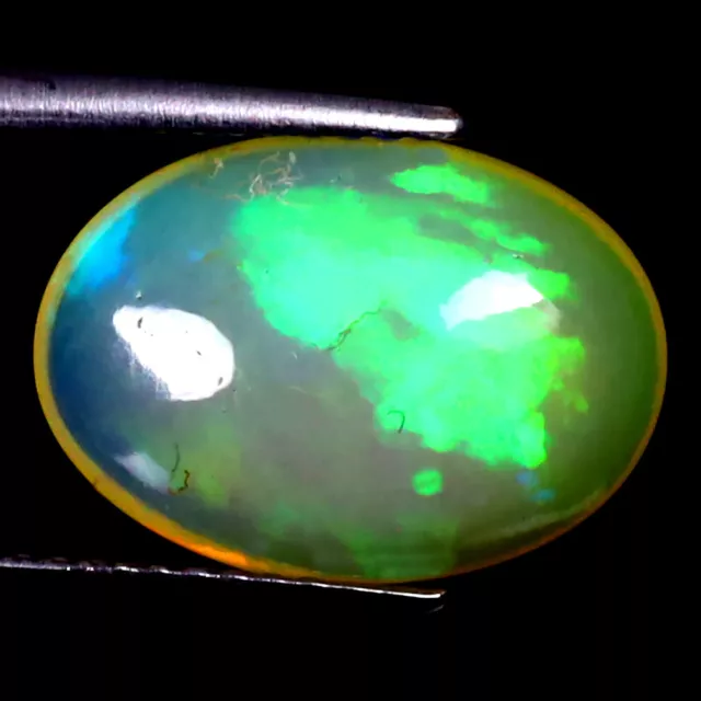 3.29 ct Attractive Oval Cabochon (14 x 10 mm) Ethiopian Flashing Rainbow Opal