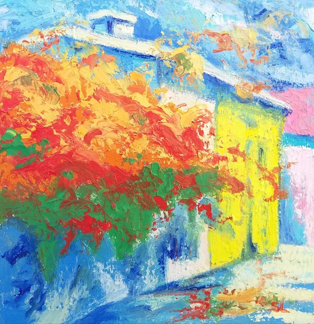 Tableau carré Maison de village bordée de généreuses fleurs oranges et rouges