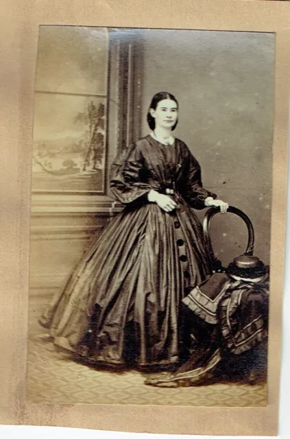 Victorian cdv type photo young lady standing long dress hat on chair Victorian cdv type photo young lady standing long dress hat on chair