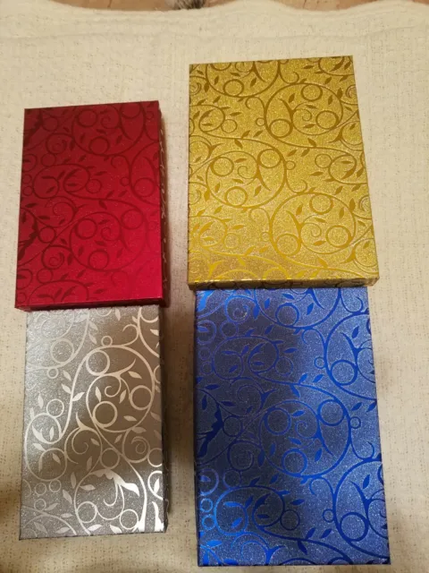 gift boxes with lids This is for 4 assorted sized gift boxes 1 Gold 1 Blue 1 Re