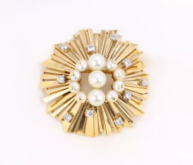 CARTIER Broche soleil en or et platine sertie de perles et diamants