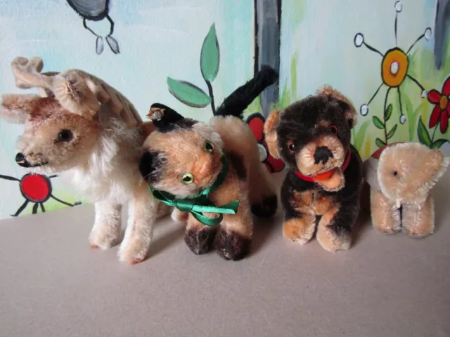 Steiff Konvolut, Renny, Gussy, Lumpi und Elefant, 10 cm, teils mit K, 50/60er-J.