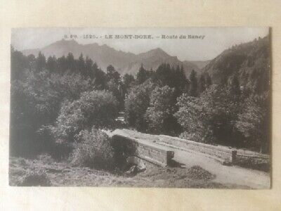 Cpa Le Mont Dore (63) Route Du Sancy
