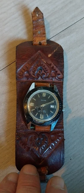 MONTRE DE PLONG E homme avec un gros bracelet cuir voir photos EUR