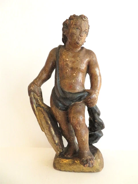 STATUE du XVIIIe en bois peint. ANGE tenant une roue.