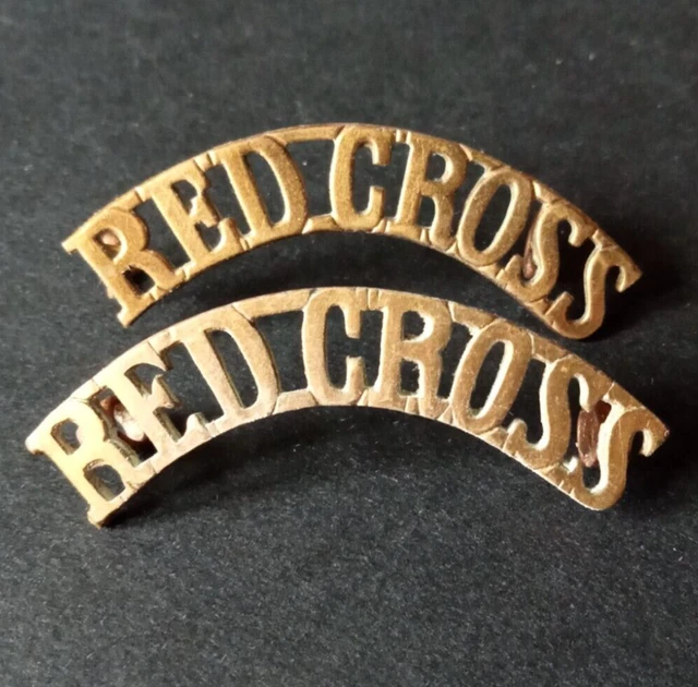 Pair of vintage brass RED CROSS shoulder title badges 2 lugs each.