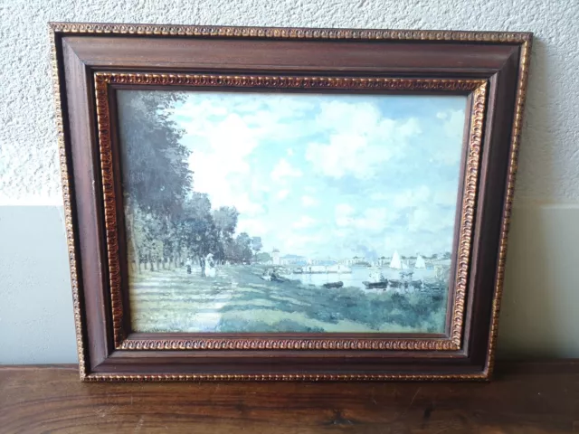 Antiguo  Cuadro con un marco hecho en madera tallada