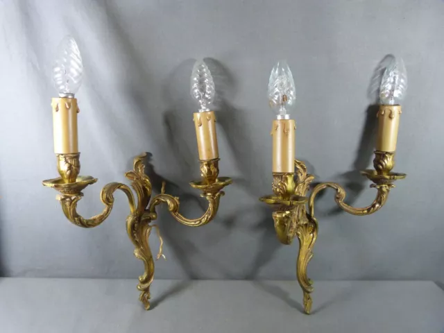 Pair of Rococo style gilt bronze French wall sconces