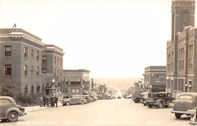 J68/ Crystal Falls Michigan RPPC Postcard c40-50s Superior Ave Stores 80