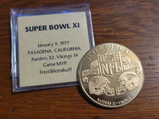 NFL Super Bowl XI Flip Challenge Coin Raiders vs Minnesota Vikings