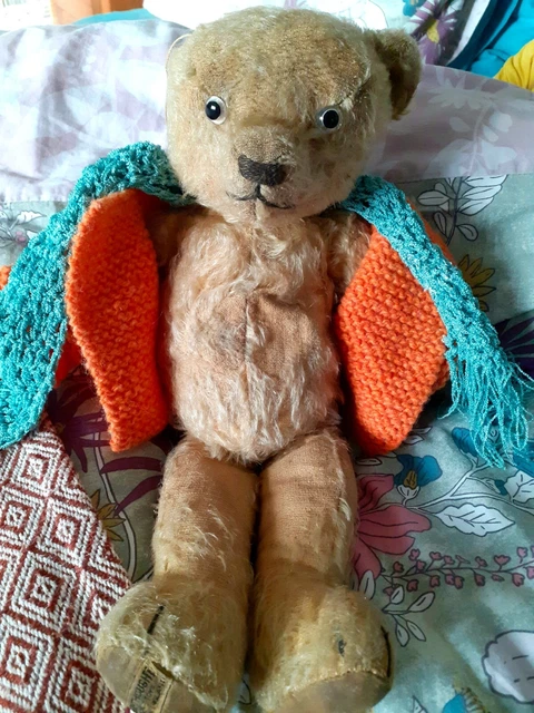 A modern Merrythought limited edition Cheeky Silken Tip teddy bear, a Merrythought mohair teddy bear