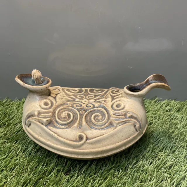 Genie oil lamp pottery.