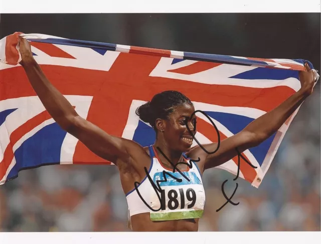 GREAT BRITAIN: CHRISTINE OHURUOGU SIGNED 10x8 ACTION PHOTO+COA *LONDON 2012*