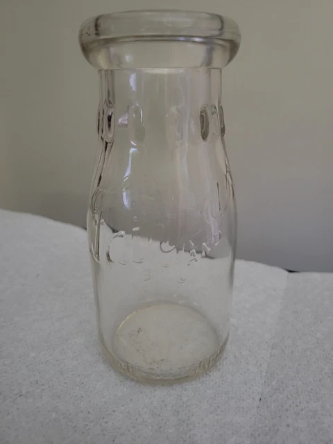Fairfax Brand Embassy Brand on 1/2 pint clear glass milk bottle.