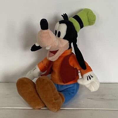 goofy doll on shelf