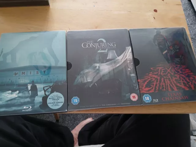 3 Blu Ray Steelbooks. Conjuring 2, The Mist, Texas Chainsaw.