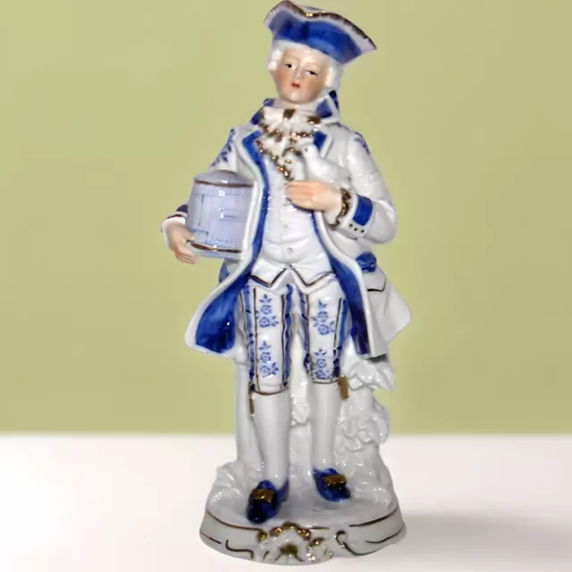 Vintage KPM Colonial Man holding dove  Figurine Blue & White gold trim Porcelain