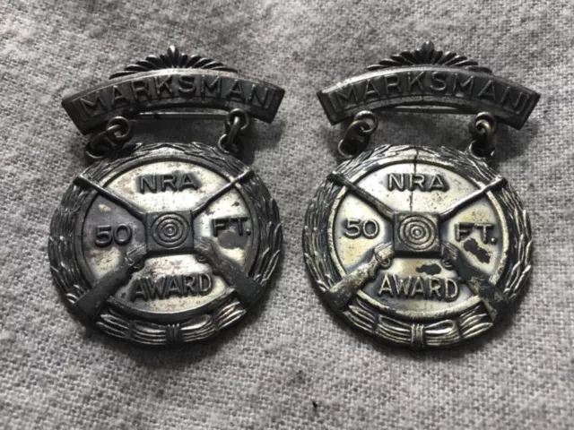 2 x VINTAGE GUN RIFLE NRA MARKSMAN 50 FT AWARD MEDALS/PINS