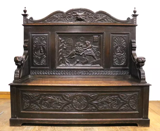 Large Antique heavily carved Greenman oak monks storage bench - settle