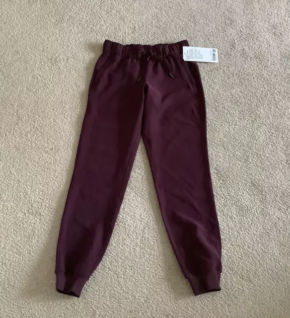 NWT LULULEMON ON The Fly Jogger Woven Red Cassis Maroon Size 2 $55.00 -  PicClick