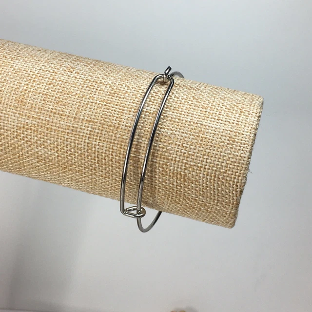 Brazalete ajustable en tono plateado / cierre de gancho de lote antiguo