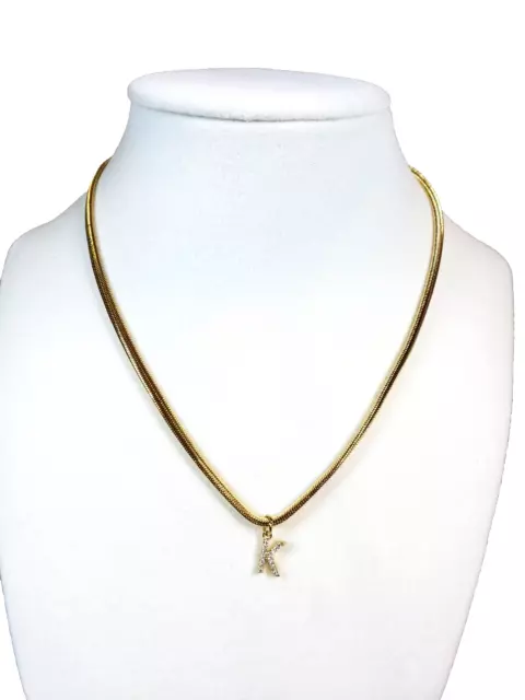 women gold tone chain necklace with K shape pendant