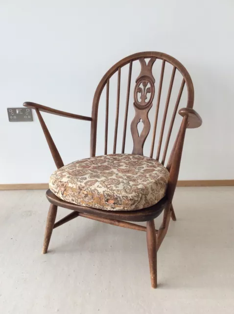 Ercol fleur de lys rocking sale chair