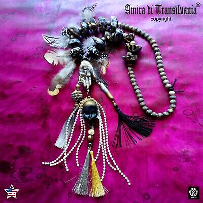 shuar tribe ecuador ethnic necklace primitive jewelry feathers tsantsa bead doll