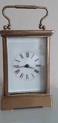 Large cased 8-day antique carriage clock. Original silvered  escapement .