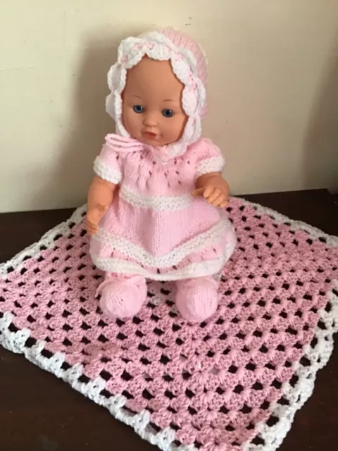 14 inch baby doll dressed in hand knitted outfit/ blanket
