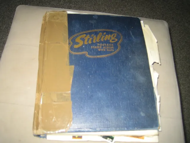 world stamps packed in stirling old tatty stamp album