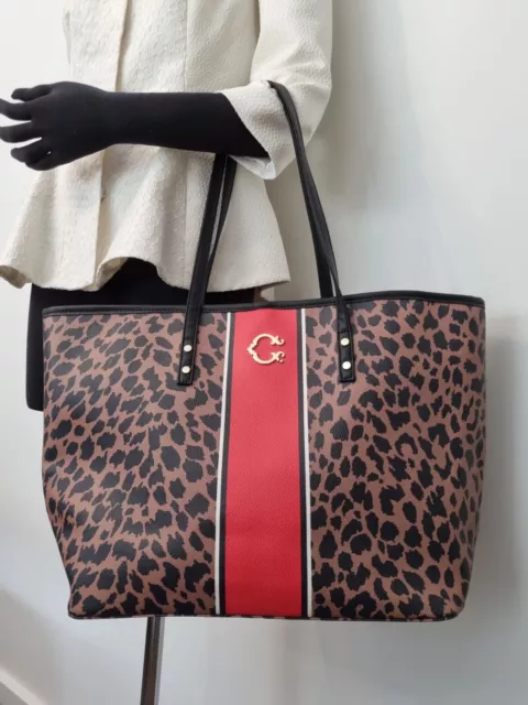 C. Wonder Womans Handbag Tote Large Animal Print Red White Stripe Black