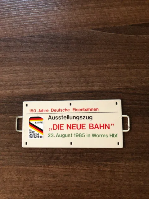 Zuglaufschild Metall Mini - 150 Jahre / Die neue Bahn / 23.08.1985 in Worms Hbf