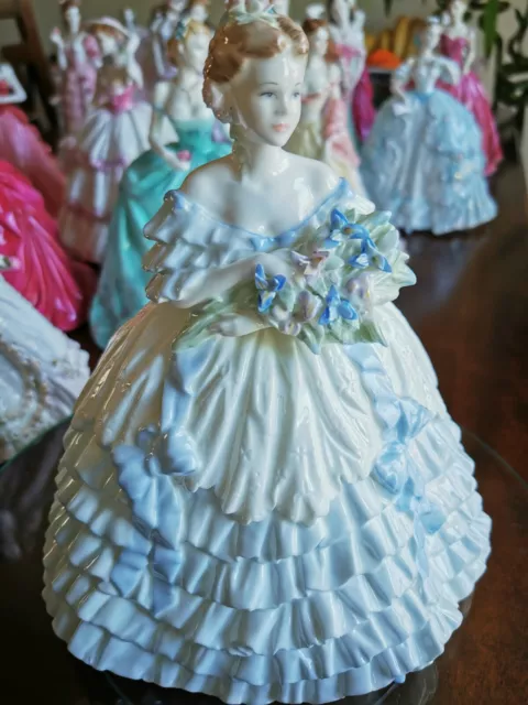 A Coalport Figurine "IRIS" Limited Editions, One of the Four Flowers Collections