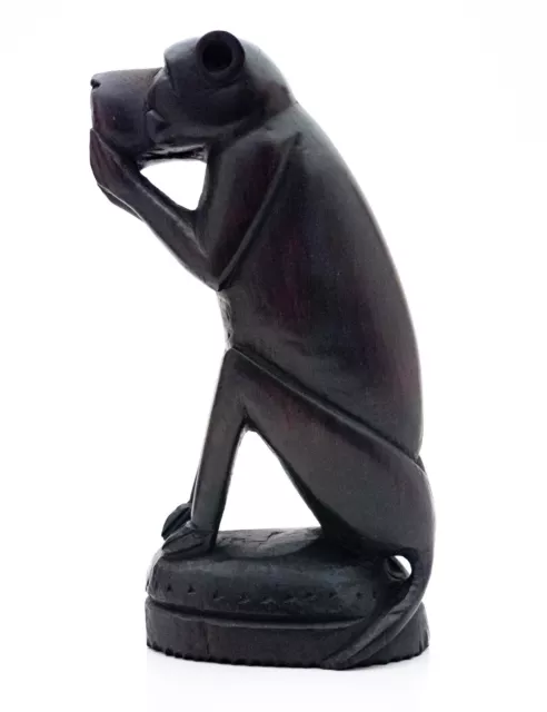 An unusual African Carved ebony seated female baboon figurine holding its mouth. 2