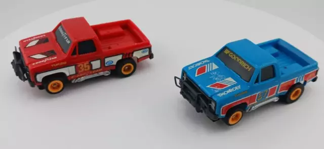 VINTAGE AURORA TOMY GMC PICK UP Slot Cars Red 35 Blue 57 Set