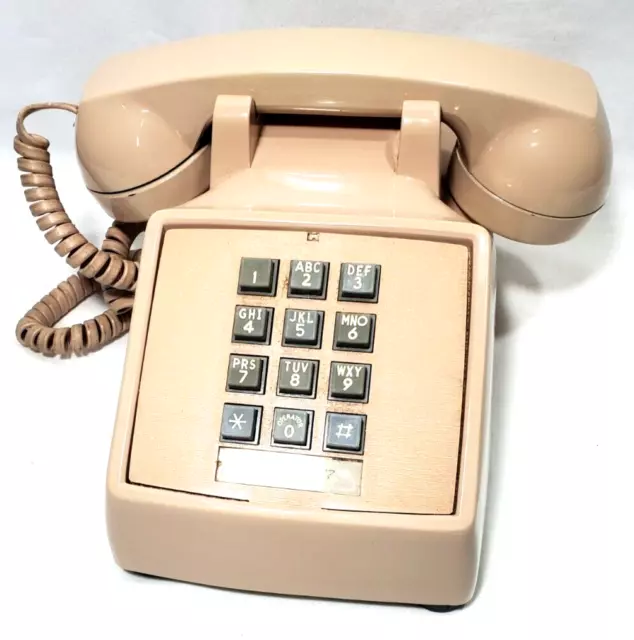 DE COLECCIÓN Beige Bronceado Stromberg Carlson con botón pulsador 1982