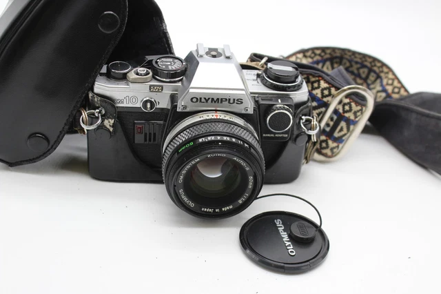 Cámara réflex F vintage Olympus OM10 con lente Zuiko Auto-S 50 mm 1,8 + estuche.