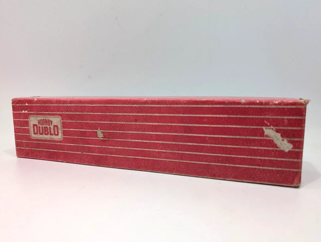 A collection of Hornby Dublo three-rail items, including locomotive