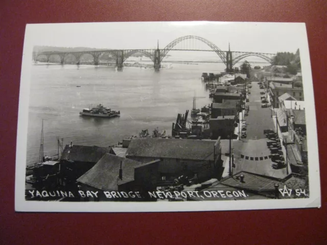 1940s NEWPORT OR OREGON RPPC VIEW - WATERFRONT / STREET SCENE & BRIDGE