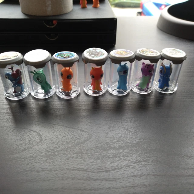 RARE lot 7 mini figurines slugs de Slugterra dans leur capsule